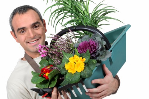 Professional landscaper working in Notting Hill garden